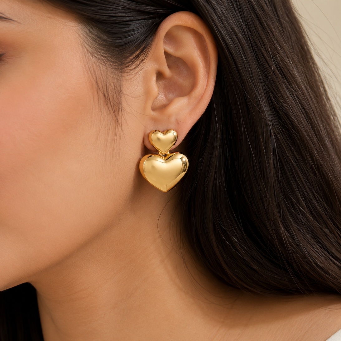 Gold Double Heart Drop Earrings worn by model